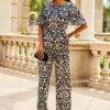 Black & White Mono Print Satin Angel Sleeve Wide Leg Jumpsuit 2 Black & White Mono Print Satin Angel Sleeve Wide Leg Jumpsuit -SOSANDAR Sales web crop 2307 83 s23jw038bkcv01 83 048