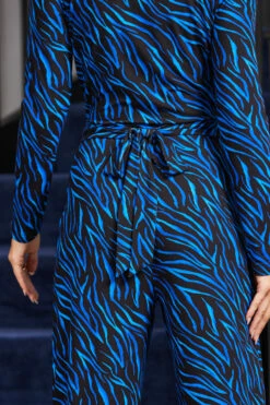 Blue Animal Print Wrap Front Wide Leg Jumpsuit With Pockets 12 Blue Animal Print Wrap Front Wide Leg Jumpsuit With Pockets -SOSANDAR Sales web rt 107 a20jj004blan01 108